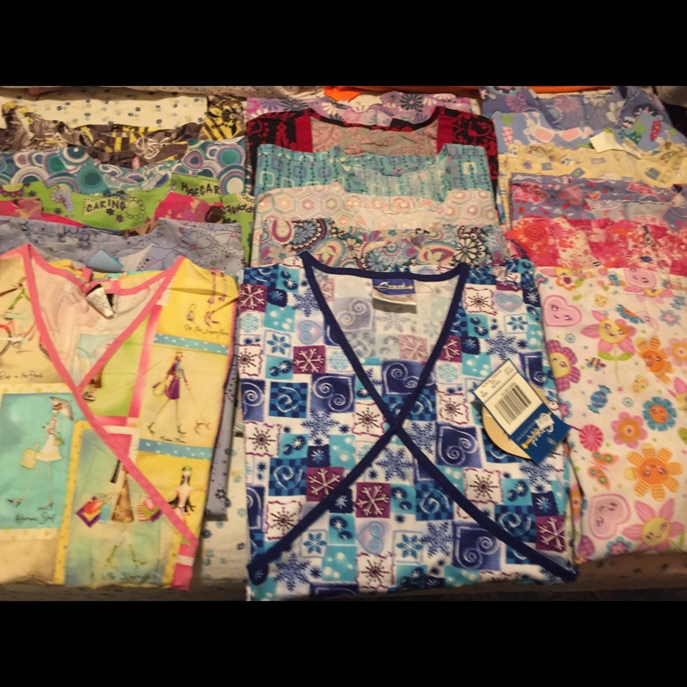 Large size scrubs 19 shirts, and  7 pants.